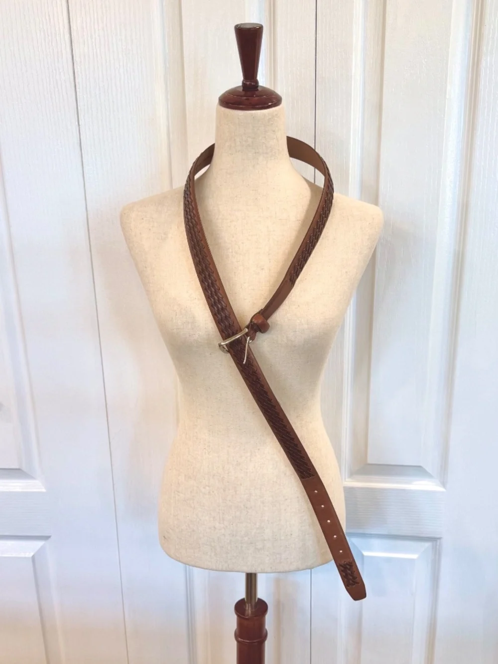 Men's size 44 100% unique leather belt by George, silver metal buckle.